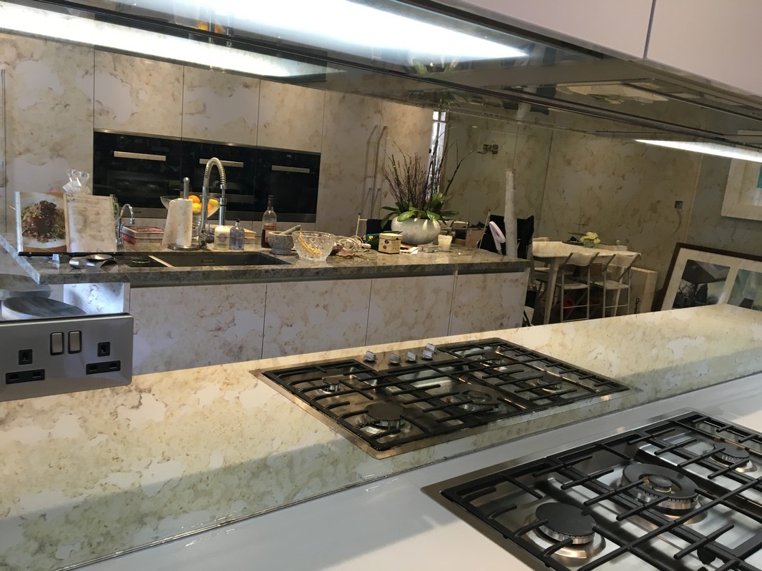 Mirror glass splashback in Shepherd's Bush luxury kitchen