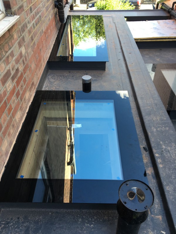Multiple flat roof skylights on extension in Shepherd's Bush